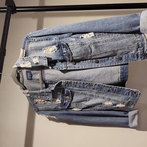 Distressed denim jacket
